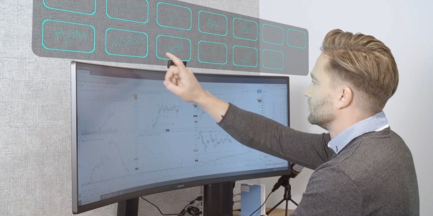 Grega Horvat analysing Elliott Wave charts at his desk